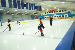 Brandon Boyer cheers on Justin Toupin during the skills demonstrations.