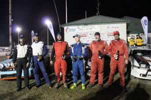 The top drivers in the regional four-wheel drive category gather for a photo by the main stage at the Dungannon Recreation Centre on Saturday, Nov. 28. From left, third place finishers Jonathan Cox and Laurens Wit, winners Jeremy Norris and Jeff Hagan, and the third place team of Bryce Baker and Derek Vincent. Photo by Nate Smelle